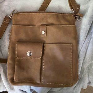 Roots Canadian Villager in tribe leather